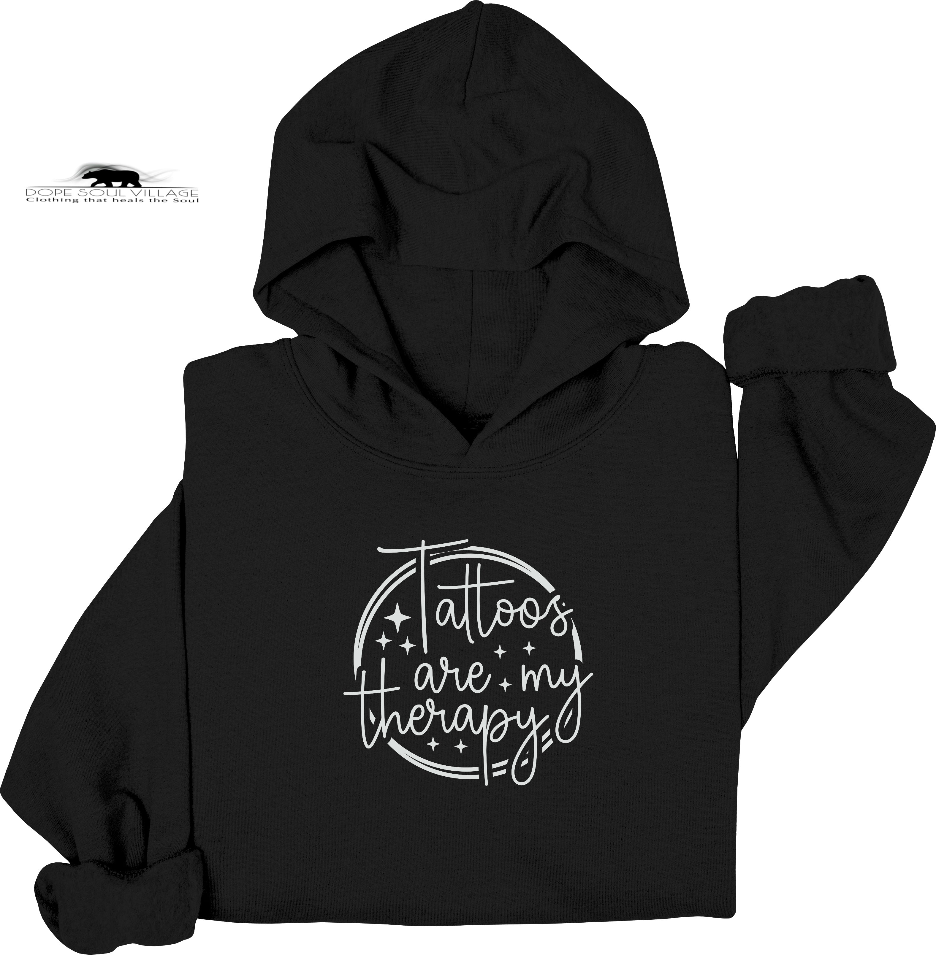 Black hoodie with 'Tattoos are my therapy' text on a white background