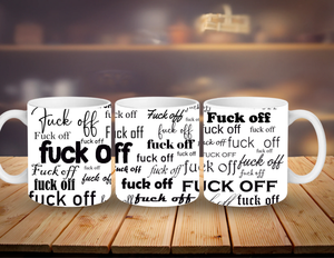 Three white mugs with 'F**K OFF' printed in black on a wooden surface.