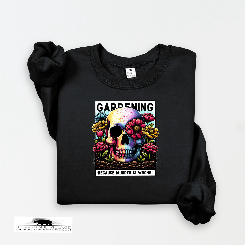 Black sweatshirt with a colorful skull design and text on a white background