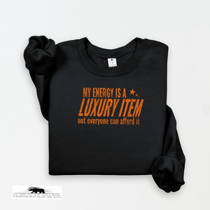 Black sweatshirt with orange text on a white background