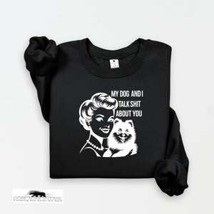 Black sweatshirt with graphic design and text on a white background