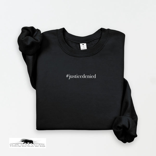 Black sweatshirt with '#justicedenied' text on a white background rebecca goodwin