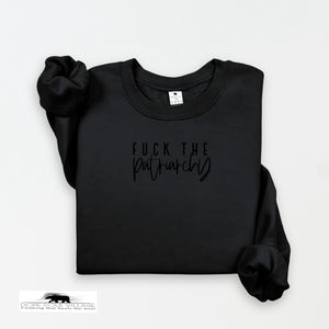Black sweatshirt with 'F*ck the Patriarchy' text on a white background