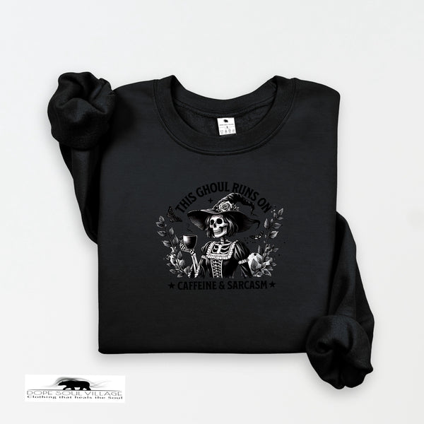Black sweatshirt with a graphic design on a white background