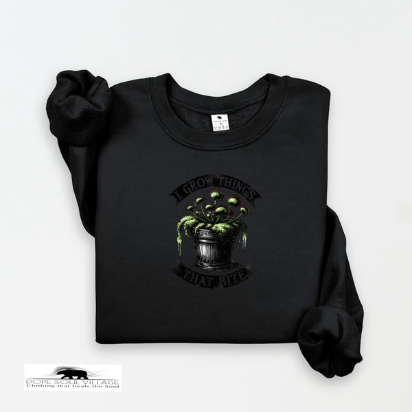 Black sweatshirt with a graphic design on a white background