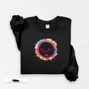 Black sweatshirt with colorful graphic design on a white background