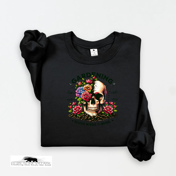 Black sweatshirt with a skull and floral design on a white background