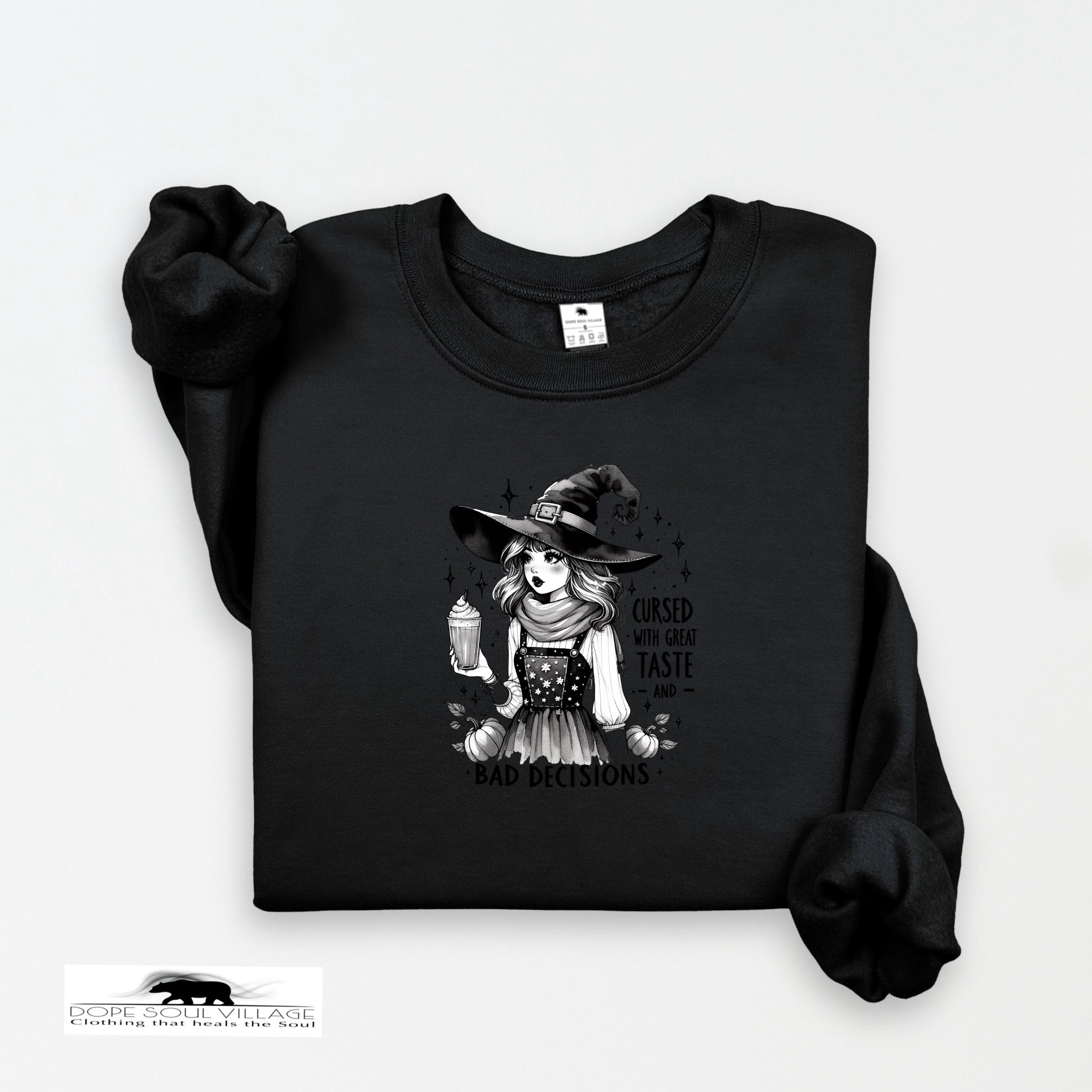 Black sweatshirt with a graphic of a witch and text on a white background