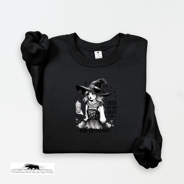 Black sweatshirt with a graphic of a witch and text on a white background