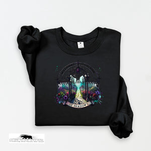Black sweatshirt with a colorful graphic design on a white background