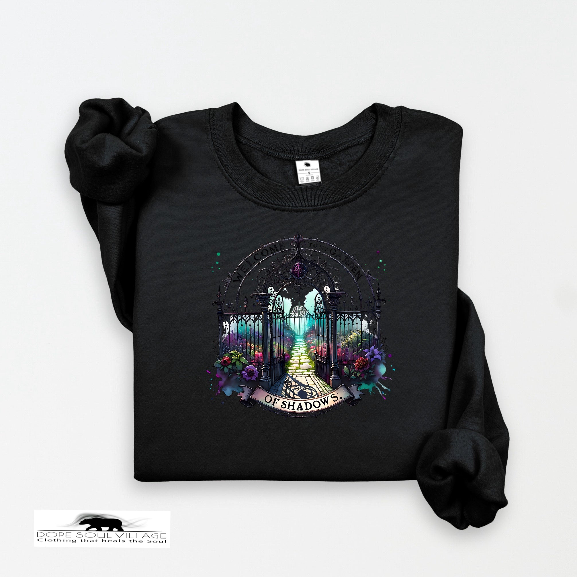 Black sweatshirt with a colorful graphic design on a white background
