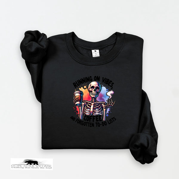 Black sweatshirt with a colorful skeleton design and text on a white background