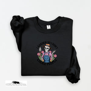 Black sweatshirt with a skeleton gardener graphic and text on a white background