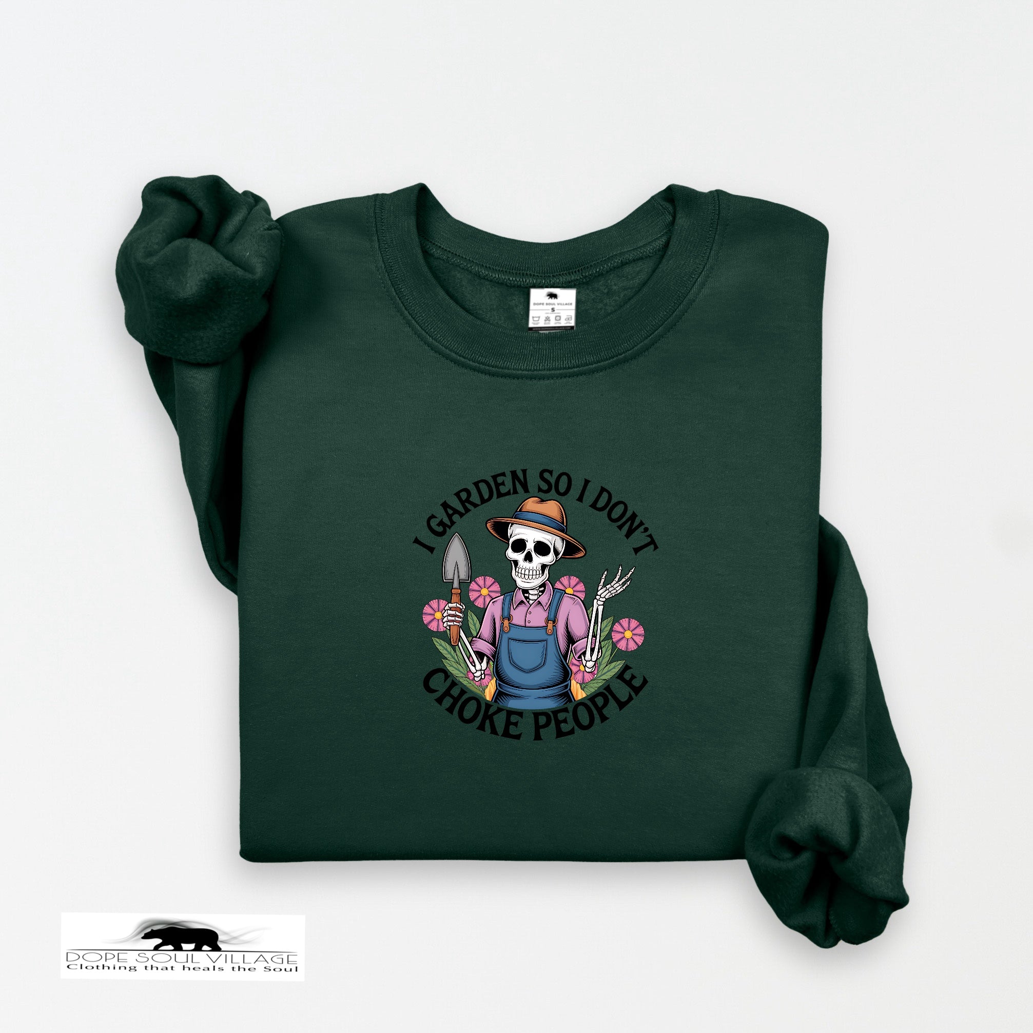 Green sweatshirt with a graphic design on a white background