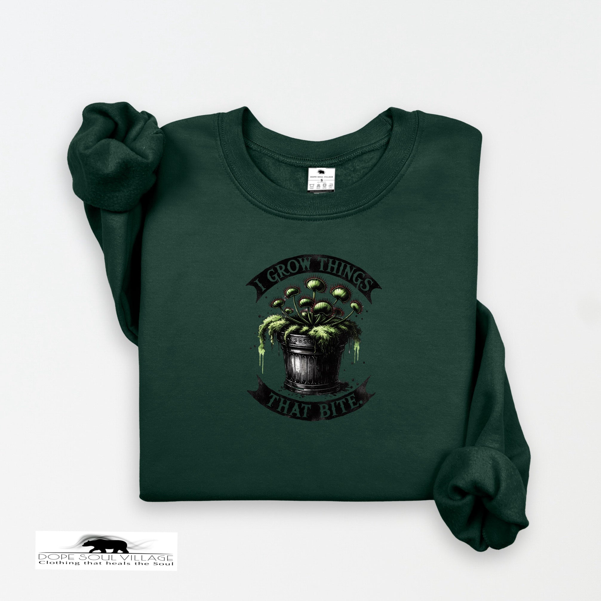 Dark green sweatshirt with a graphic design on a white background