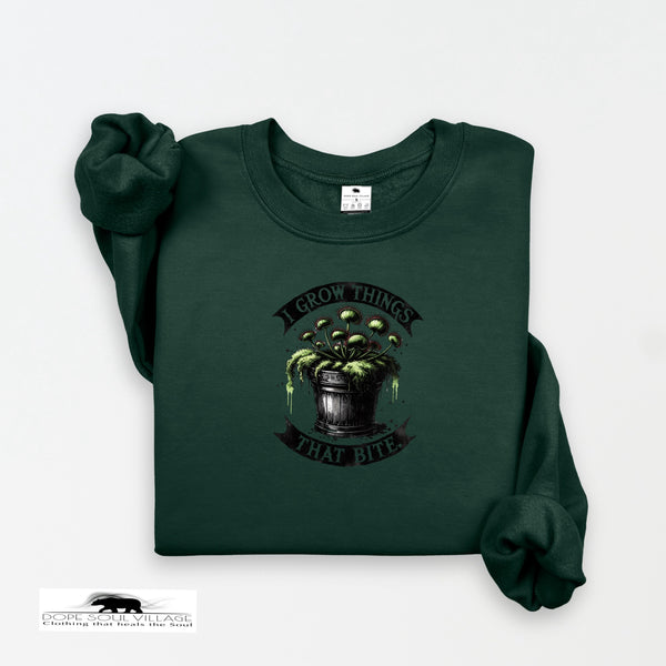 Dark green sweatshirt with a graphic design on a white background