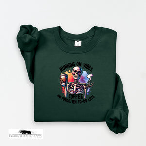 Green sweatshirt with skeleton design and text on a white background