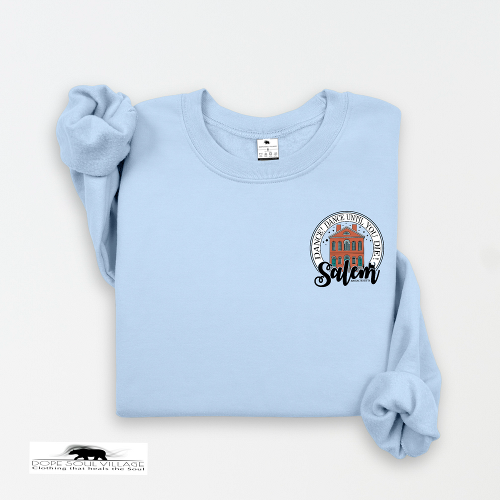 Light blue sweatshirt with a graphic design on a white background dope soul village salem sisters 