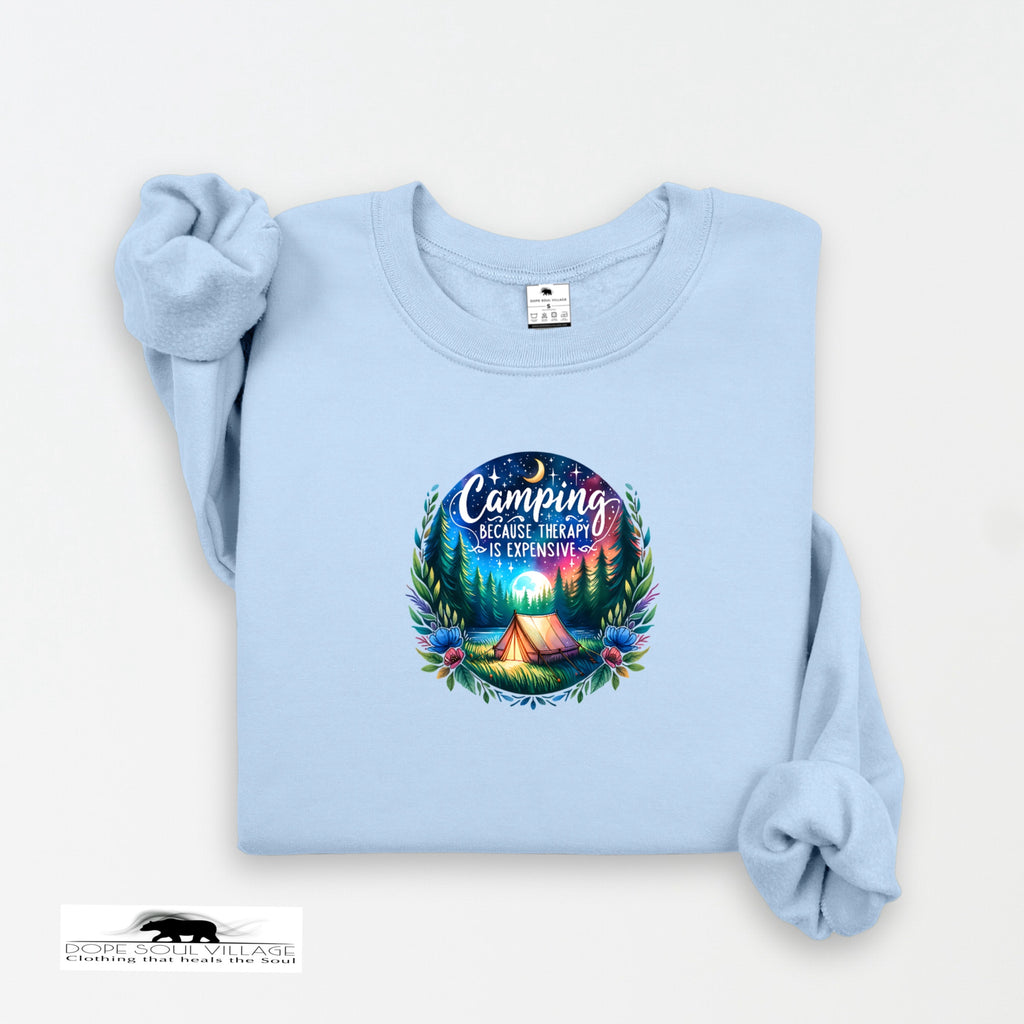 Light blue sweatshirt with a camping graphic and text on a white background