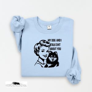 Light blue sweatshirt with graphic design and text on a white background
