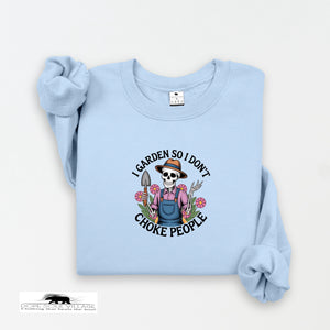 Light blue sweatshirt with a graphic design and text on a white background