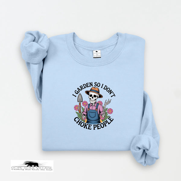 Light blue sweatshirt with a graphic design and text on a white background