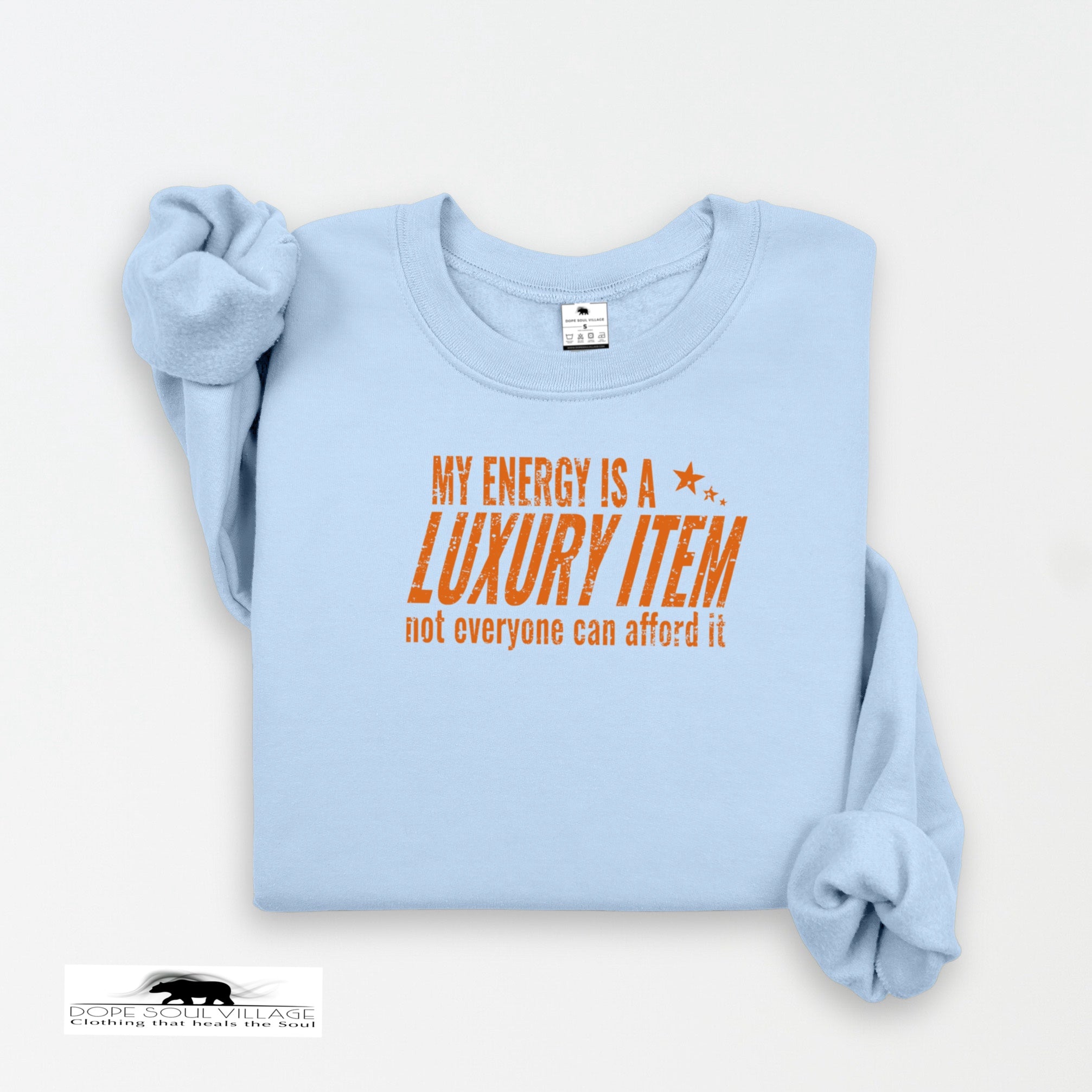 Light blue sweatshirt with orange text on a white background
