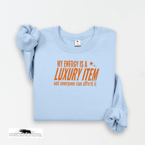 Light blue sweatshirt with orange text on a white background