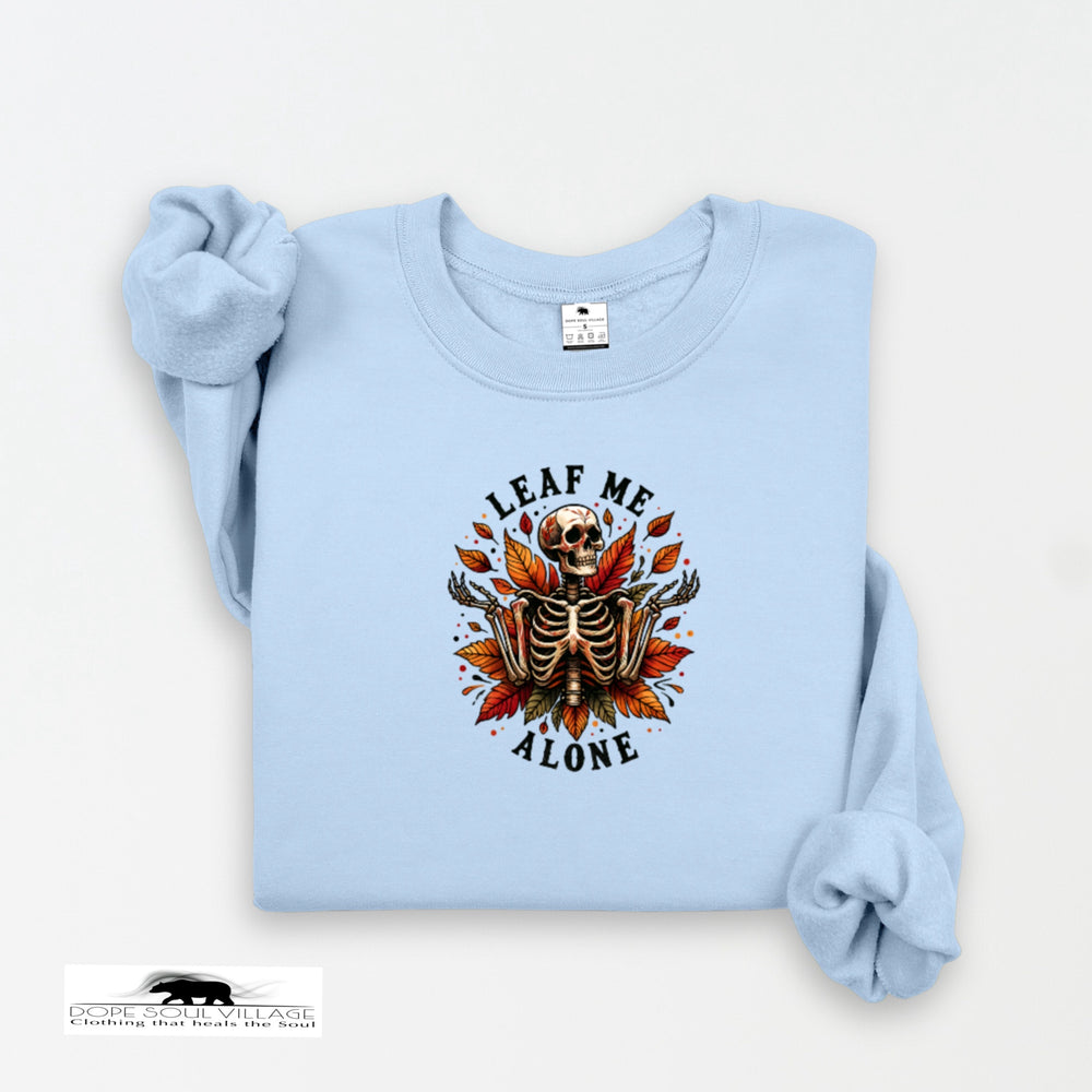 Light blue sweatshirt with skeleton and leaf design on a white background