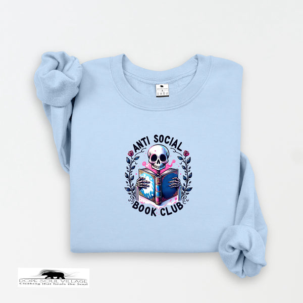 Light blue sweatshirt with a skull and book design on a white background