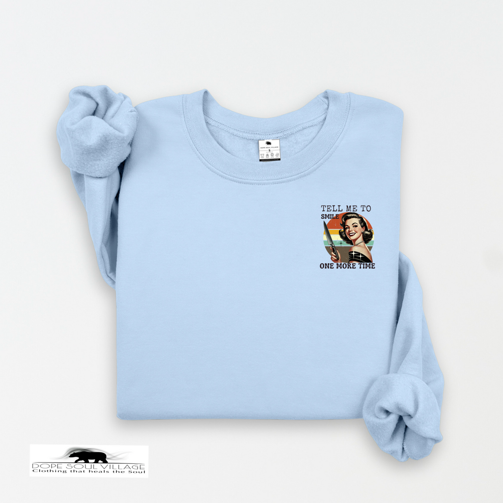 Light blue sweatshirt with graphic design and text on a white background