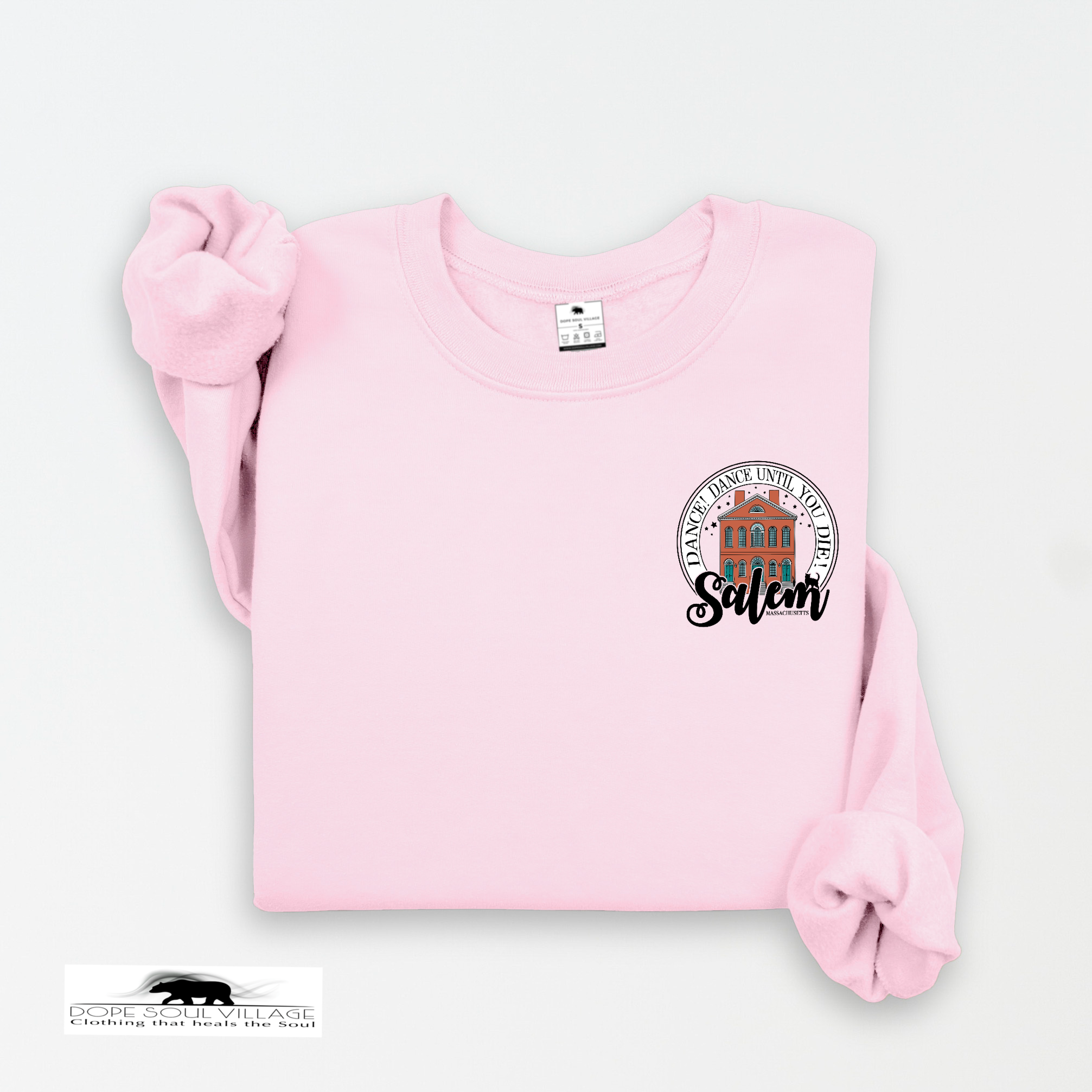 Pink sweatshirt with a graphic design on a white background salem sister halloween collection