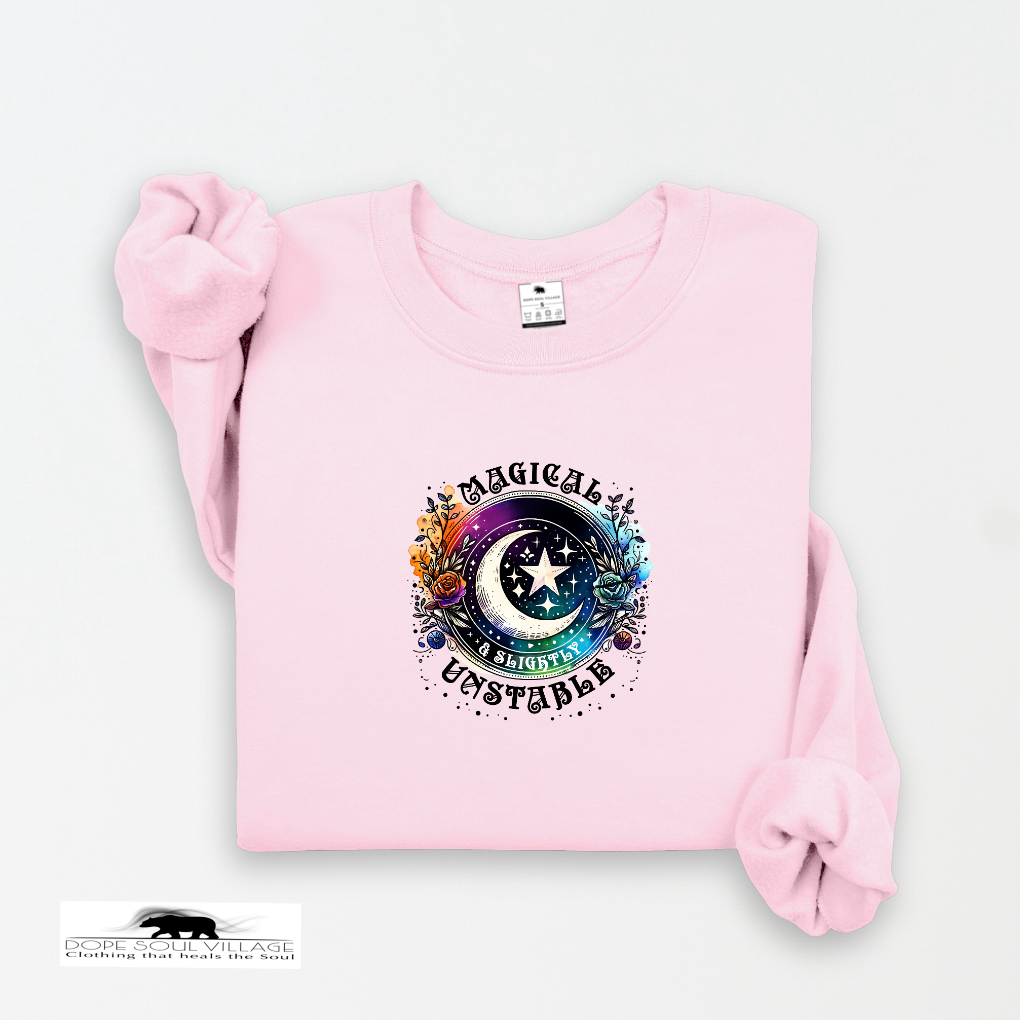 Pink sweatshirt with a colorful graphic design on a white background