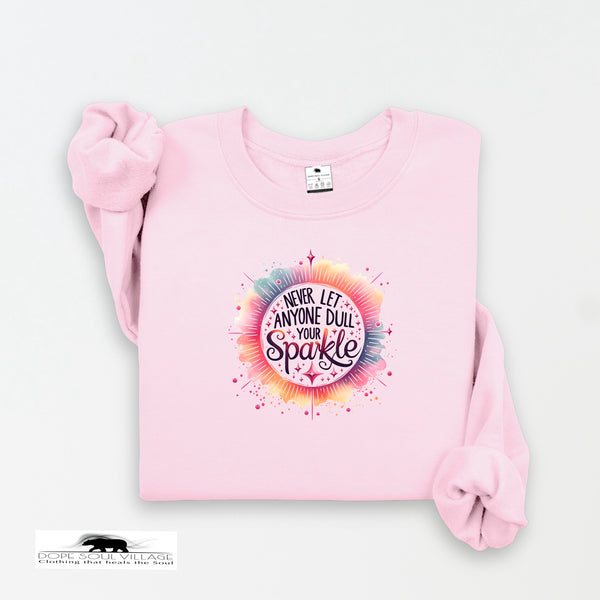 Pink sweatshirt with colorful graphic and text on a white background