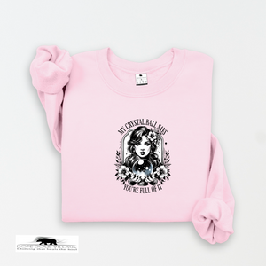 Pink sweatshirt with graphic design and text on a white background