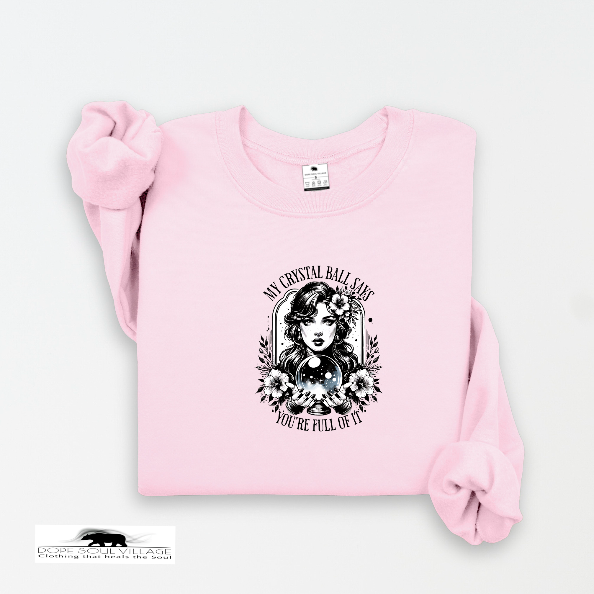 Pink sweatshirt with graphic design and text on a white background
