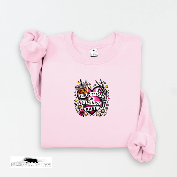Pink sweatshirt with a graphic design on a white background