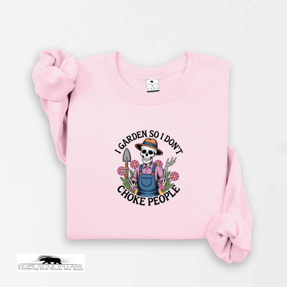 Pink sweatshirt with a graphic design on a white background
