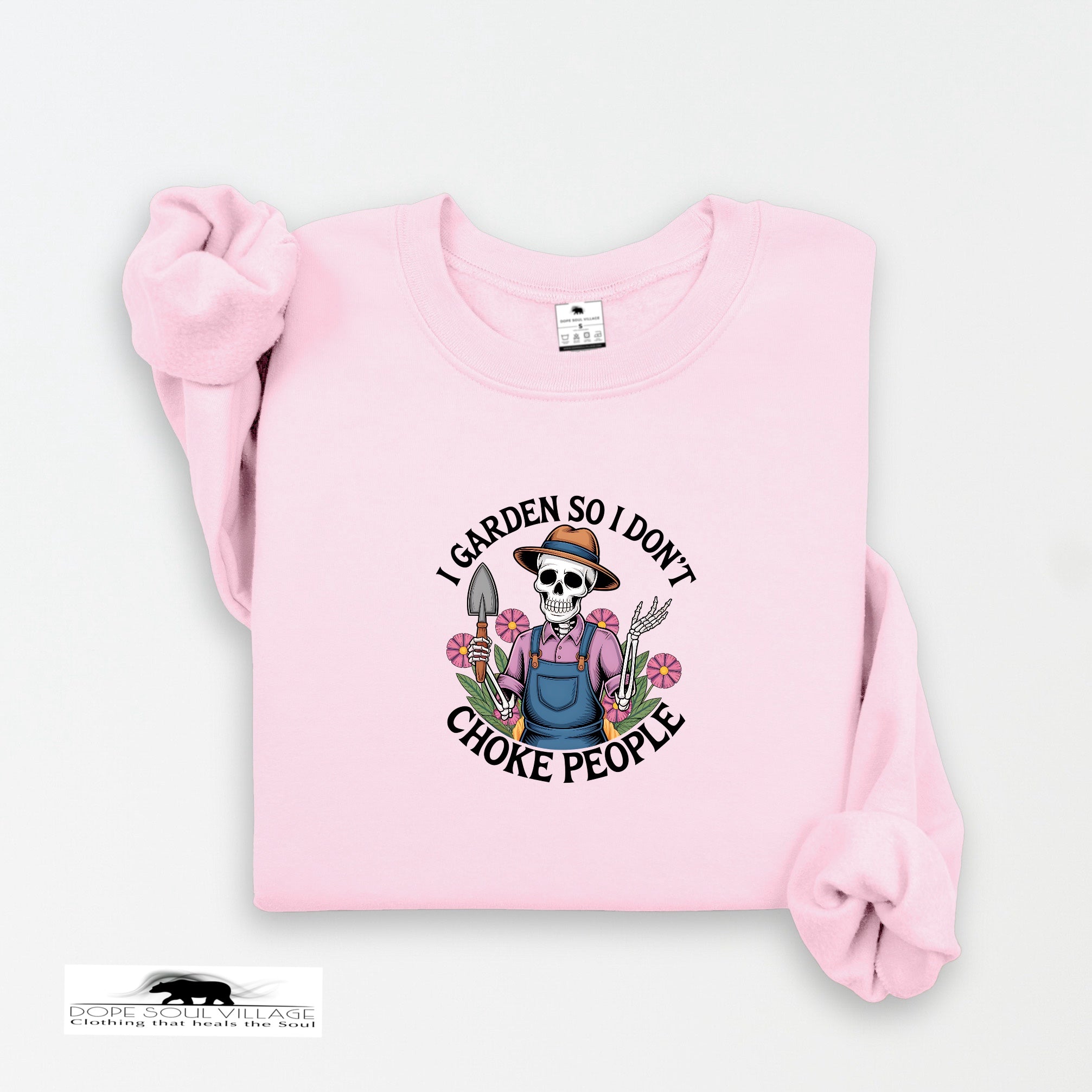 Pink sweatshirt with a graphic design on a white background