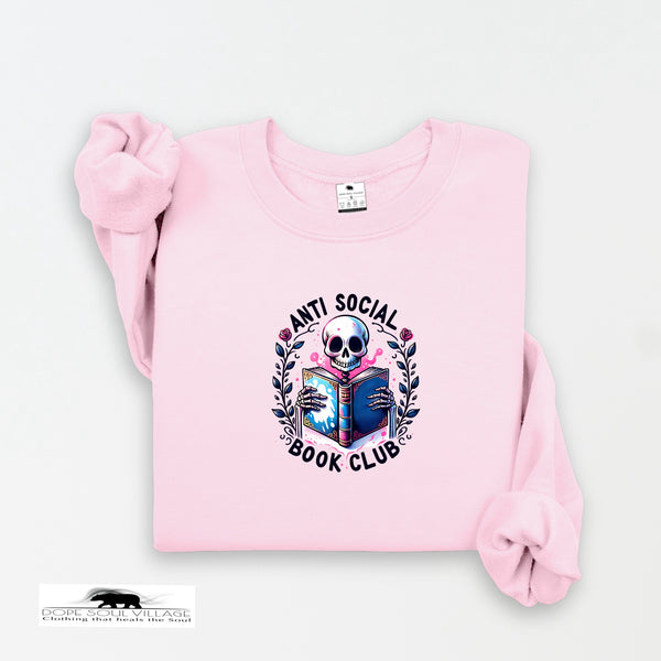 Pink sweatshirt with 'Anti Social Book Club' graphic on a white background