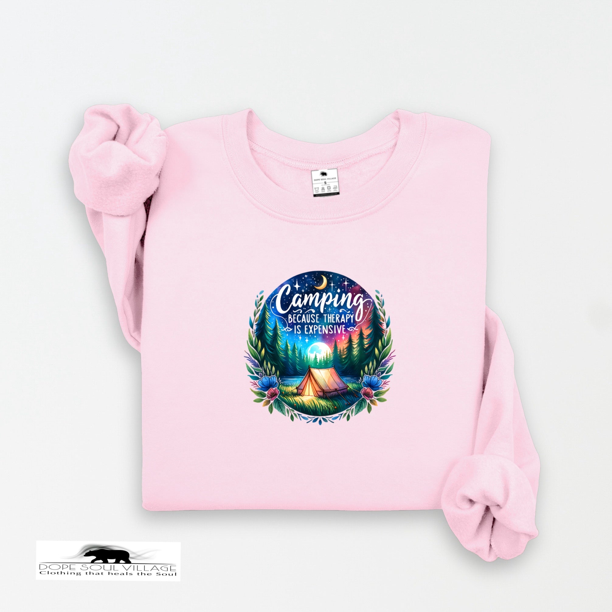 Pink sweatshirt with a colorful graphic and text on a white background