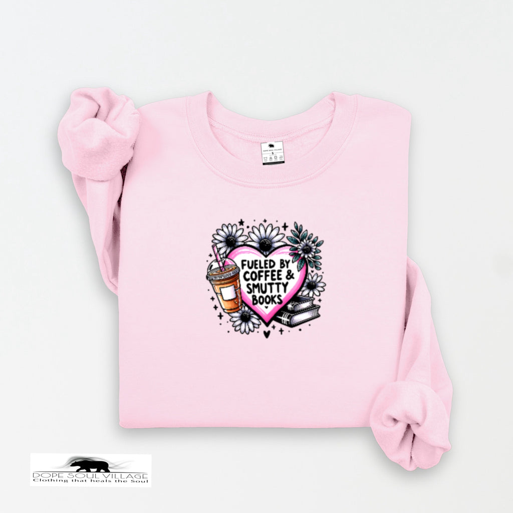 Pink sweatshirt with a graphic design on a white background
