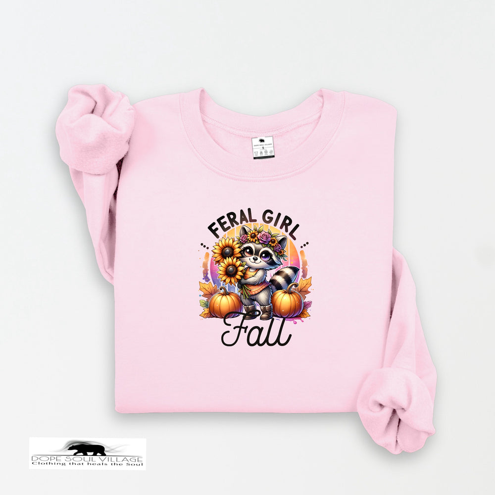 Pink sweatshirt with a raccoon and pumpkin design on a white background