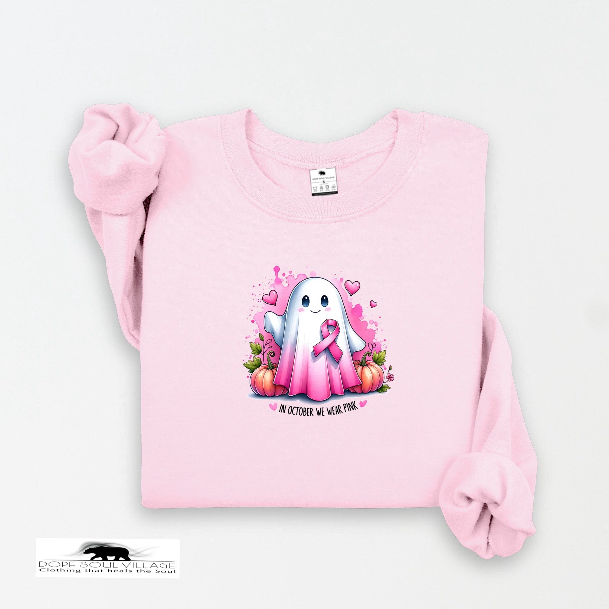 Pink sweatshirt with a cartoon ghost holding a pink ribbon on a white background