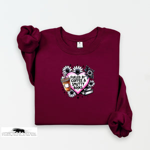 Maroon sweatshirt with a graphic design on a white background