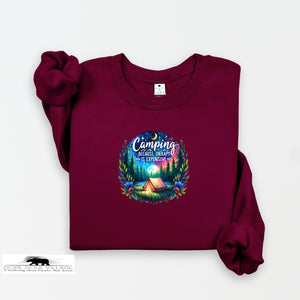 Maroon sweatshirt with a colorful camping graphic and text on a white background