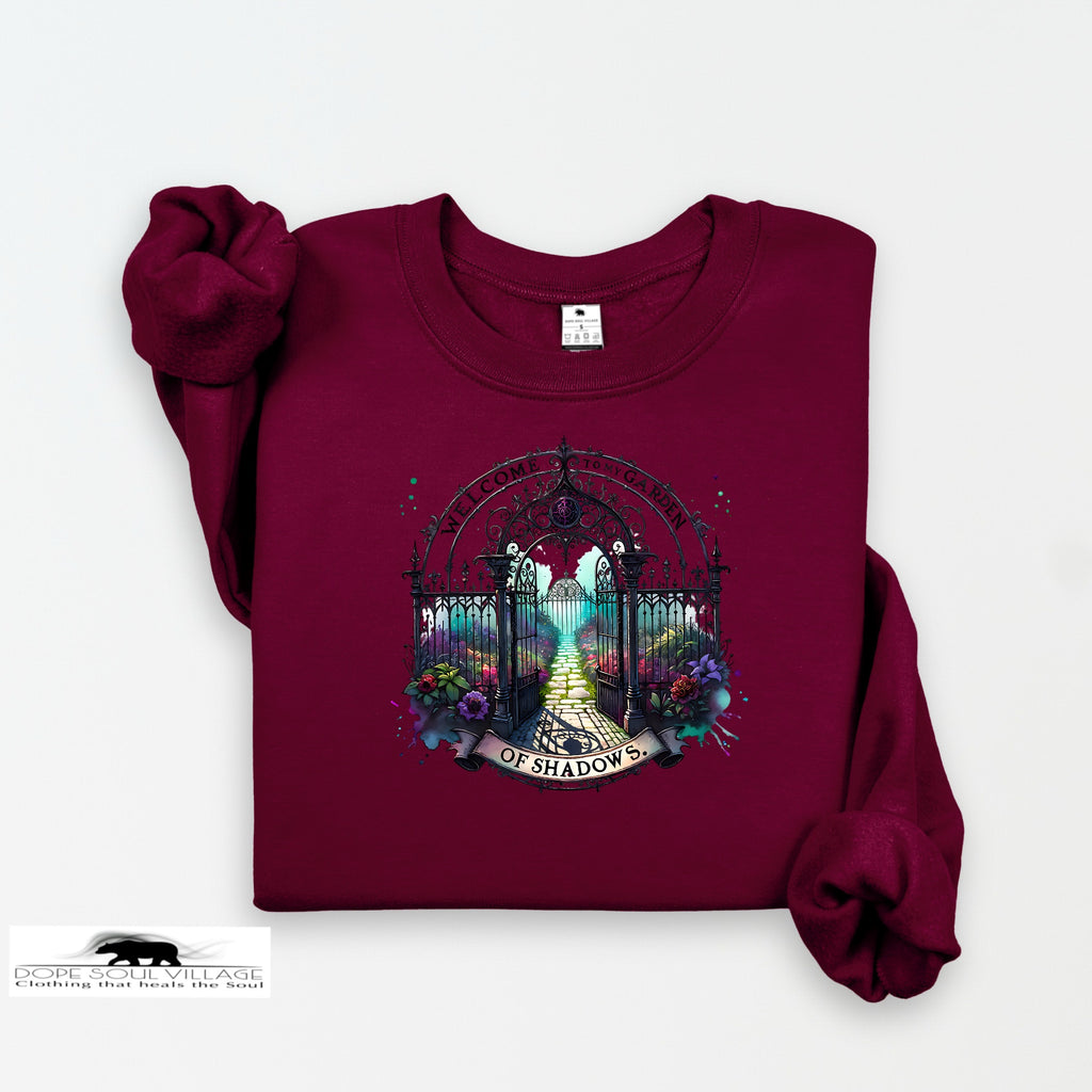 Maroon sweatshirt with a gate design on a white background