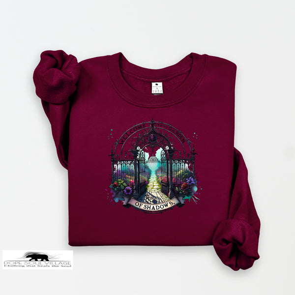 Maroon sweatshirt with a gate design on a white background