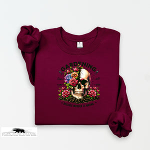 Maroon sweatshirt with a skull and floral design on a white background