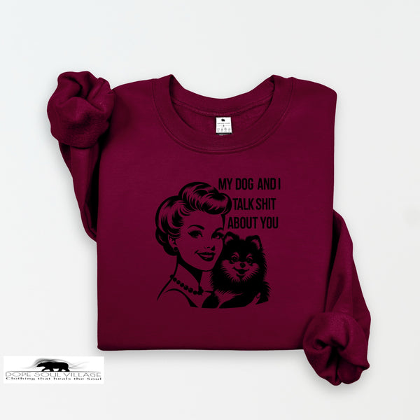 Maroon sweatshirt with graphic design and text on a white background